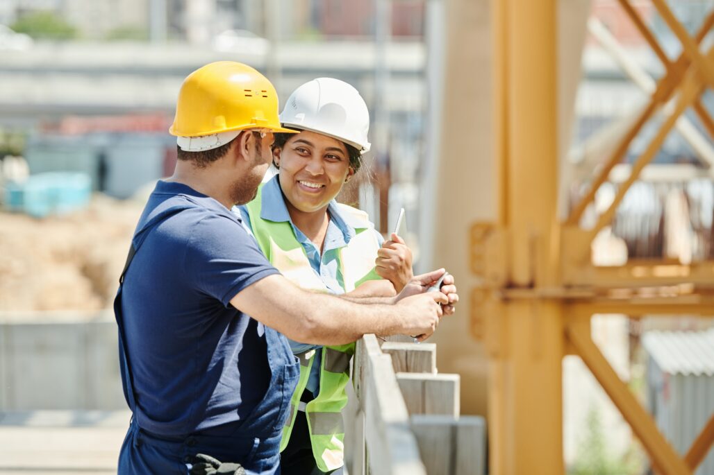 Two Workers on a Construction Site